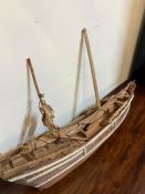 A scratch built wooden model of a ship (H50cm W75cm)