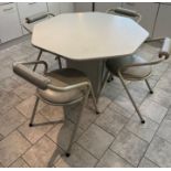 A 1980's white and grey dining table and chairs, octagonal table with tubular frame chairs by