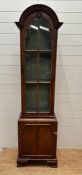 A mahogany dome topped display cabinet with two shelves and cupboard under (H 180cm x D 26cm x W