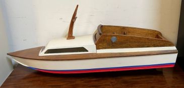 A wooden model motor boat (35cm x 36cm)
