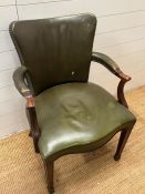 A mahogany and leather desk chairs