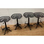 Four reproduction tractor stools