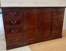 A mahogany gentleman's wardrobe with fruitwood inlay, central doors leading to cupboard with hanging