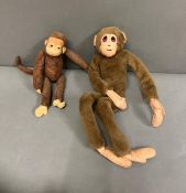 A vintage French monkey plush soft toy with jointed arms and legs along with a monkey with metal