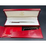 A Must De Cartier boxed Ballpoint pen in original box with card etc.