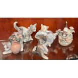 A selection of Lladro cats and Nao