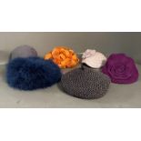 A selection of six hats by Marie Mercie