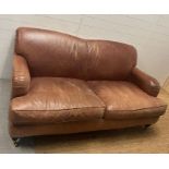 Three seater leather sofa and side chair (H81cm W180cm D93cm)