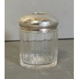 A hallmarked silver topped glass Hair Tidy, Birmingham 1909 by Boots Pure Drug Company