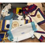 A selection of masonic medals, aprons and sashes