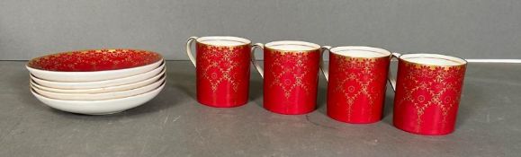 A set of four Royal Worcester coffee cans with saucers made for Asprey