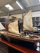 A large wooden model sail boat (126cm x 86cm)
