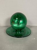 An art glass piece in green Approximate total height 21cm