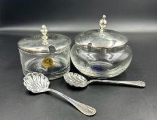 A Carrs silver and glass jam pot with silver spoon and a RCR 925 silver glass and silver jam pot