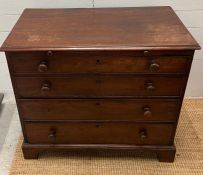 An 18th Century mahogany bachelor chest with four long drawers and brushing slide (H80cm W89cm