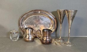 A small selection of silver plated items to include a pair of flutes, jugs etc.
