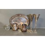A small selection of silver plated items to include a pair of flutes, jugs etc.