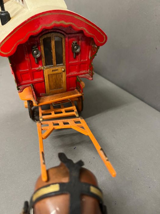 A wooden model of a Gypsy caravan with moving parts and china horse, stamped to base - Image 4 of 8