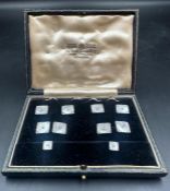 A Gents set of 9ct white gold and mother of pearl cufflinks, dress studs etc, boxed.