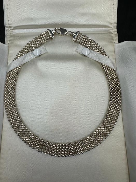 A silver necklace by Roux