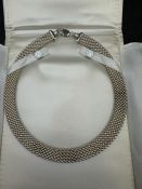 A silver necklace by Roux