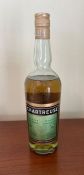 A bottle of Chartreuse liqueur