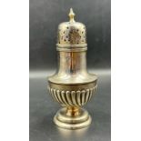 A silver sugar shaker hallmarked for London (Total weight 88g)