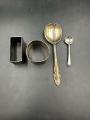 A selection of silver items to include a napkin ring and a spoon (Total weight 72g)