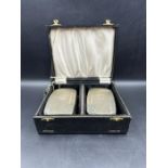 A boxed set of silver brushes, hallmarked for Birmingham 1966 by makers mark B & Co