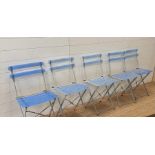 A selection of five blue slat back folding garden chairs.