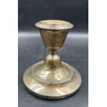 A silver candle stick hallmarked for Birmingham AF