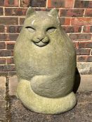 A large garden sculpture of a cat, fibre glass