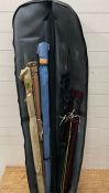 A selection of fishing rods, fishing reels and fishing bag with storage tub and a vintage stool