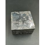 A silver embossed pill box, marked as a Foreign import, probably Dutch.