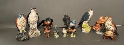 A selection of Beswick birds and one Royal Doulton