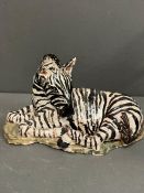 A Zebra by B.Atkinson pottery (H15cm W26cm)