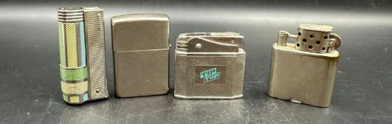 A selection of vintage lighters to include Zippo, Orlik and an Imco triplex