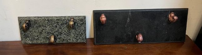 Two wall hanging coat hooks