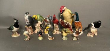 A selection of thirteen Beswick birds