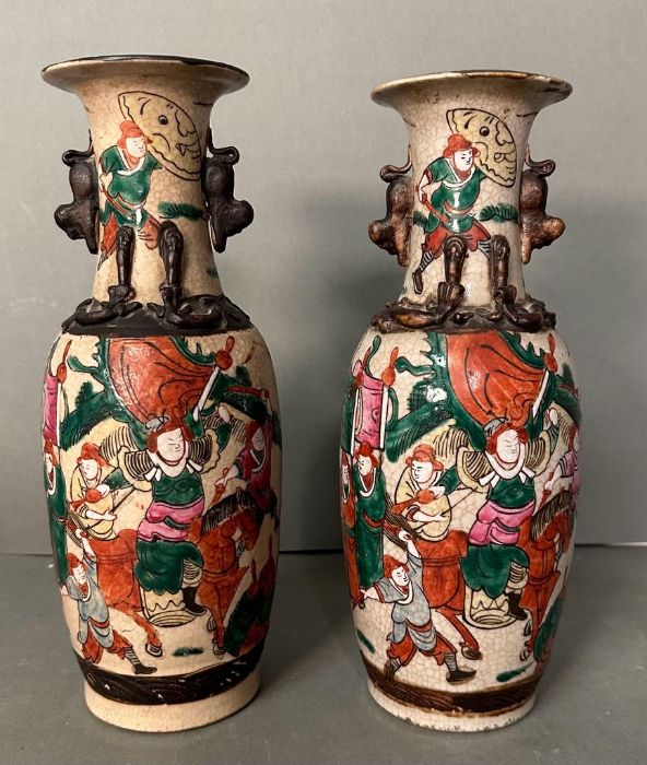 Two Chinese crackle glazed vases, hand painted with warrior scenes (H30cm)