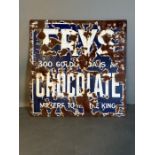 A vintage blue and white enamel sign for Frys Chocolate AF 61x61