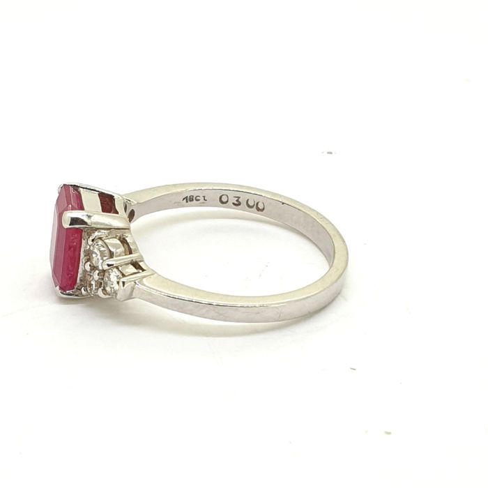 White gold ruby and diamond ring. The central ruby is flanked by three brilliant cut diamonds to - Image 2 of 2
