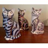 Three Royal Crown Derby cats