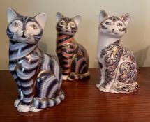 Three Royal Crown Derby cats