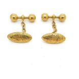 Victorian yellow metal chain linked cuff links, marked 18 with an ornate design to both the