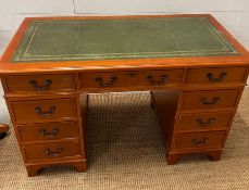 A pedestal desk with green leather writing top (H78cm W122cm D60cm)