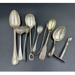 A selection of silver hallmarked cutlery including sugar nips and a baby pusher and spoon. Various