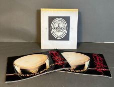 A proof sample of a Guinness drip mod and two copies of "Arthur Guinness" historical guides to the