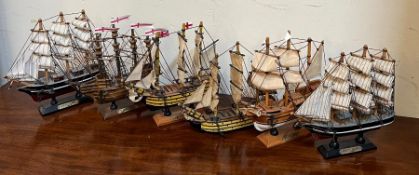 Six model sailing ships