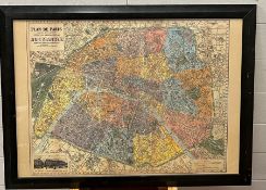 A framed map of Paris advertising Bon Marche 69cm x 49cm